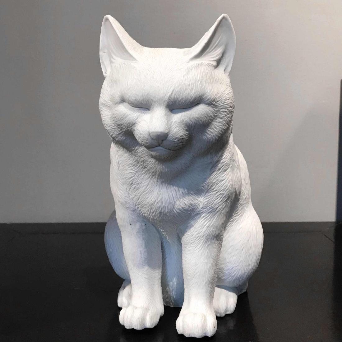 Meiji Period Bisque Porcelain Sitting Cat: A Meiji period bisque porcelain sculpture of a sitting cat with its eyes closed. This is a rare and beautiful example of one of the most famous of Hirado porcelain productions; the sitting sleeping ca