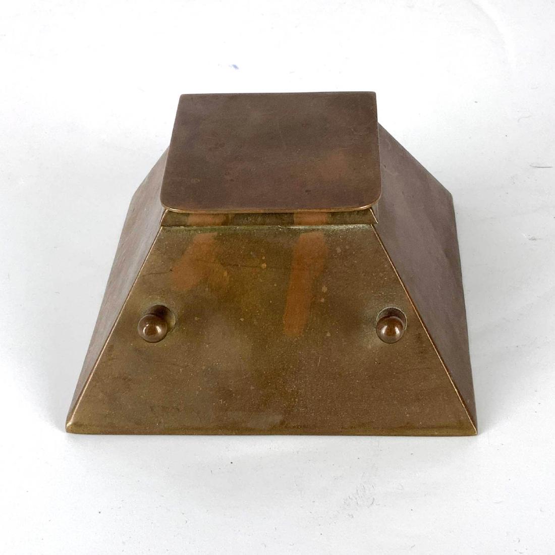 Circa 1920 Mission Bronze Ink well With Pen holder: Circa 1920 Mission Bronze Ink well With Pen holder in front, does not come with a glass insert. Overall good condition, could use polishing. Measurements 2.5 inch height x 4.5 inch width at bottom, in