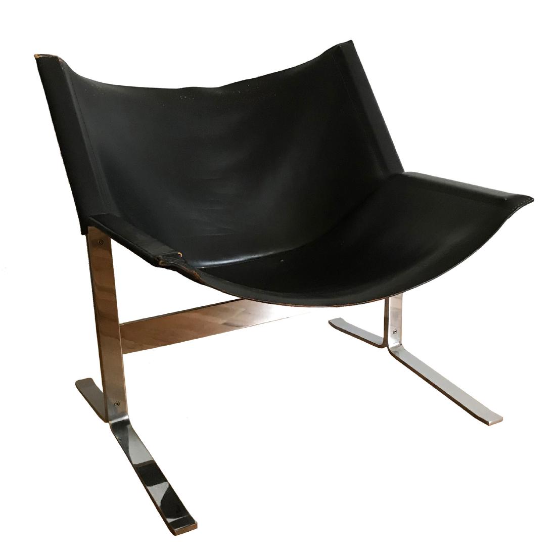 Mid Century Style Vintage Black Leather Lounge Chair: Mid Century Style Vintage Black Leather Lounge Chair with Chrome Base Approx. 27 Width x 28 Depth x 28 Height Easy convenient local pickup available, local delivery available for fee, out of area buye