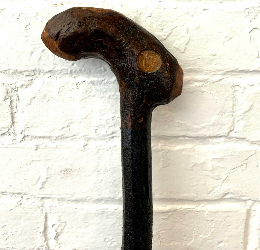 Irish Coin Burl Root Carved Cane: Carved from a root branch with an inset 1982 Eire Irish copper penny and a copper tip base at the cane. 36.5 height x 5 inch grip $28 flat fee boxing, packing, insurance, tracking and shipping rate an