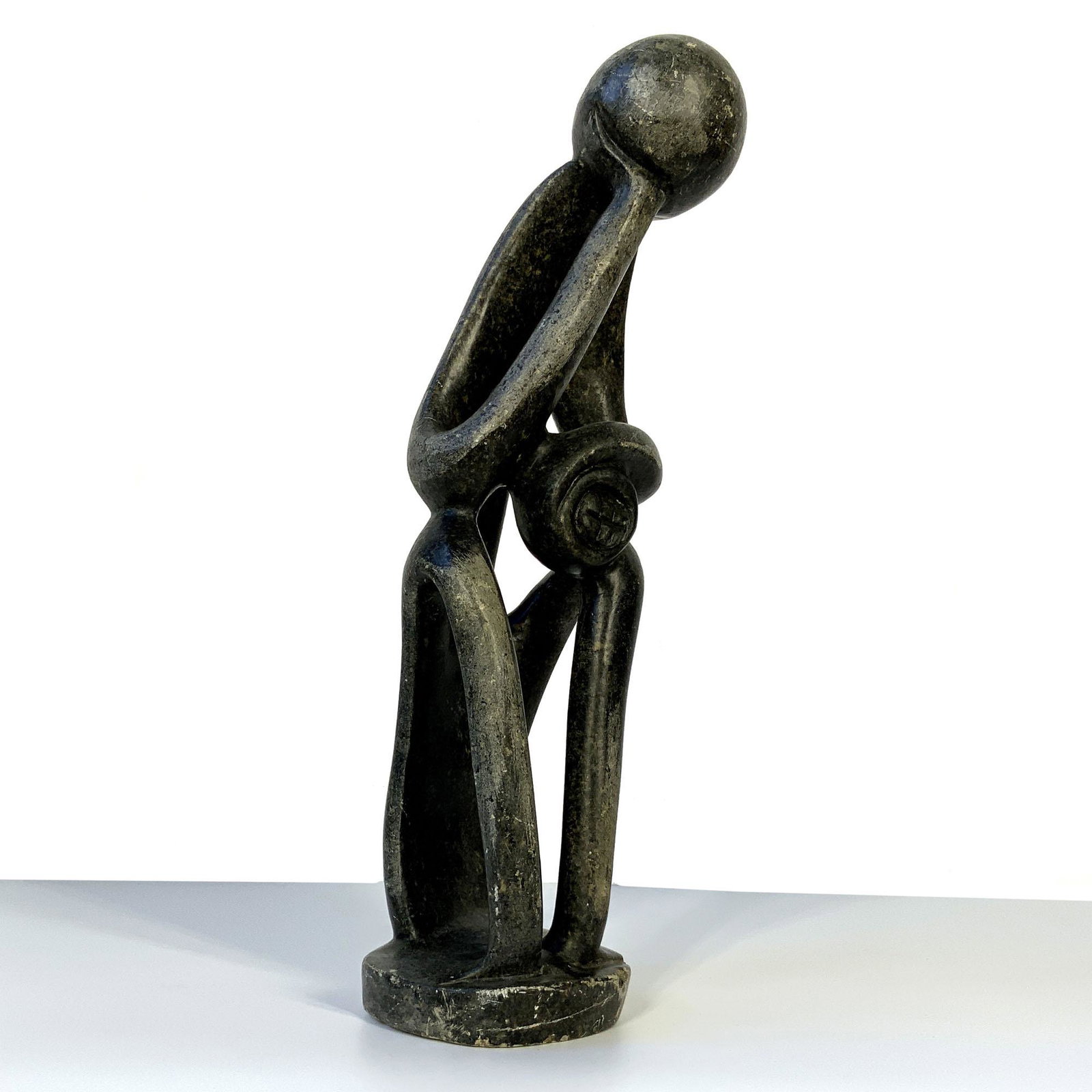 Mid Century Soap Stone Sculpture: Mid Century Figurative sculpture carved from soapstone. 19.5 H x 5 W x 5 D