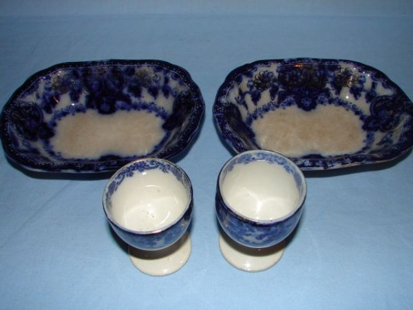 Flow blue potato bowls and egg cups