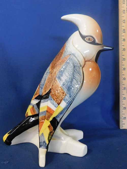 Goebel Selim Bird Kingfisher figurine: 10 inch tall bird figurine painted and styled after what appears to be Alaskan native imagery. Designed by artist "Selim" and produced by Goebel with a west German mark. Figure is free of cracks, chip