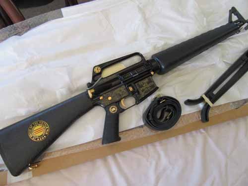 AHF Vietnam Commemorative M-16 Rifle: AHF Vietnam Marine Commemorative Rifle Vietnam Marine Commemorative M-16 with gold plated highlights- engraved with "Lest we forget", "1959-1975", engraved receiver, stock is black synthetic with embl
