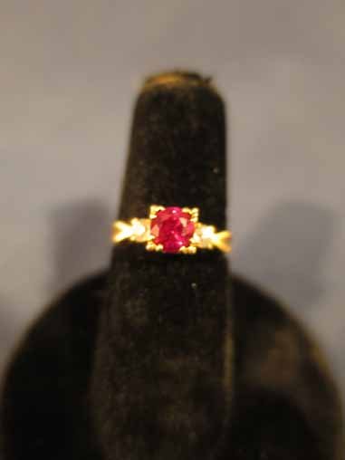 10k Ruby and diamond ring.: 10k Ruby and diamond ring.