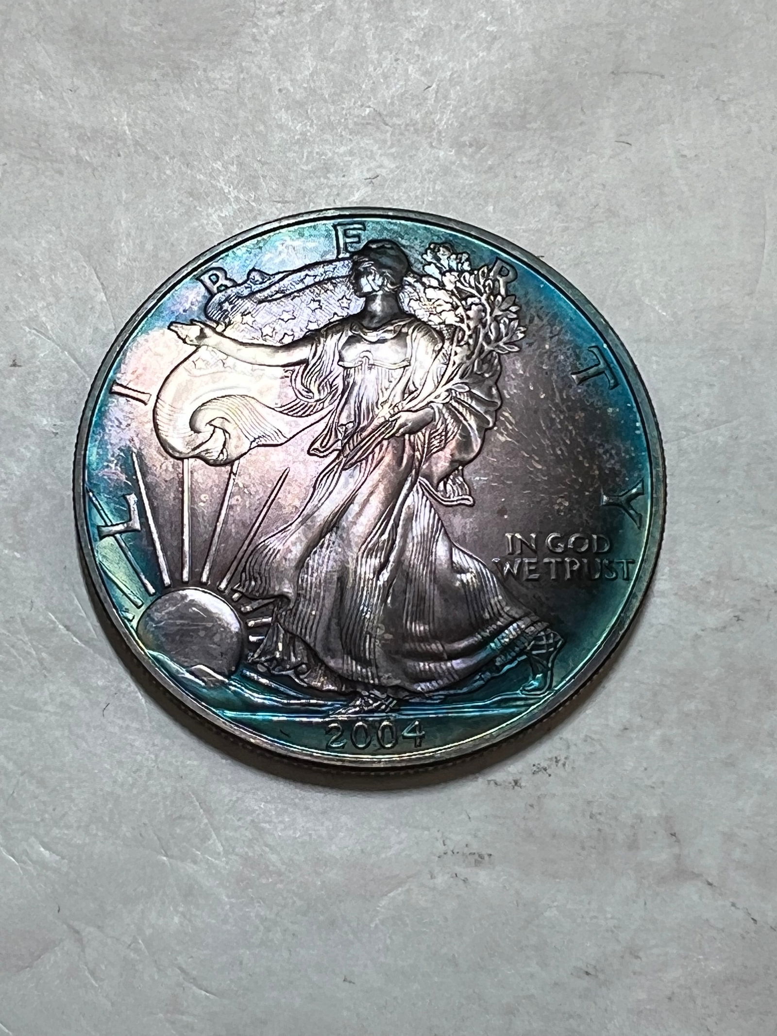 2004 1 oz. Silver American Eagle $1 BU Rainbow Toning (1 of 2)