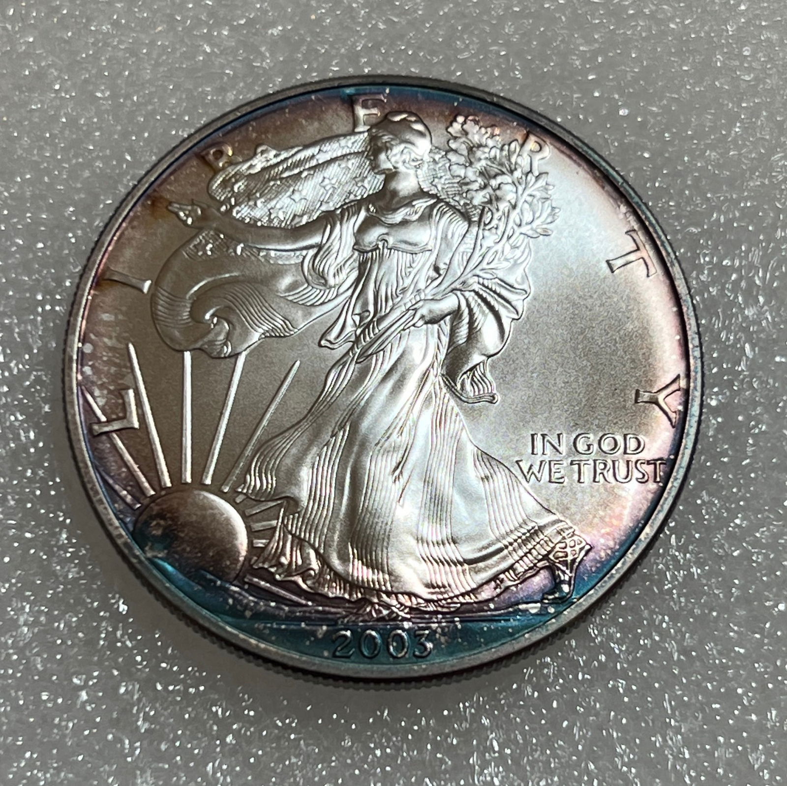 2003 1 oz. $1 Silver American Eagle BU Rainbow Toning (1 of 2)