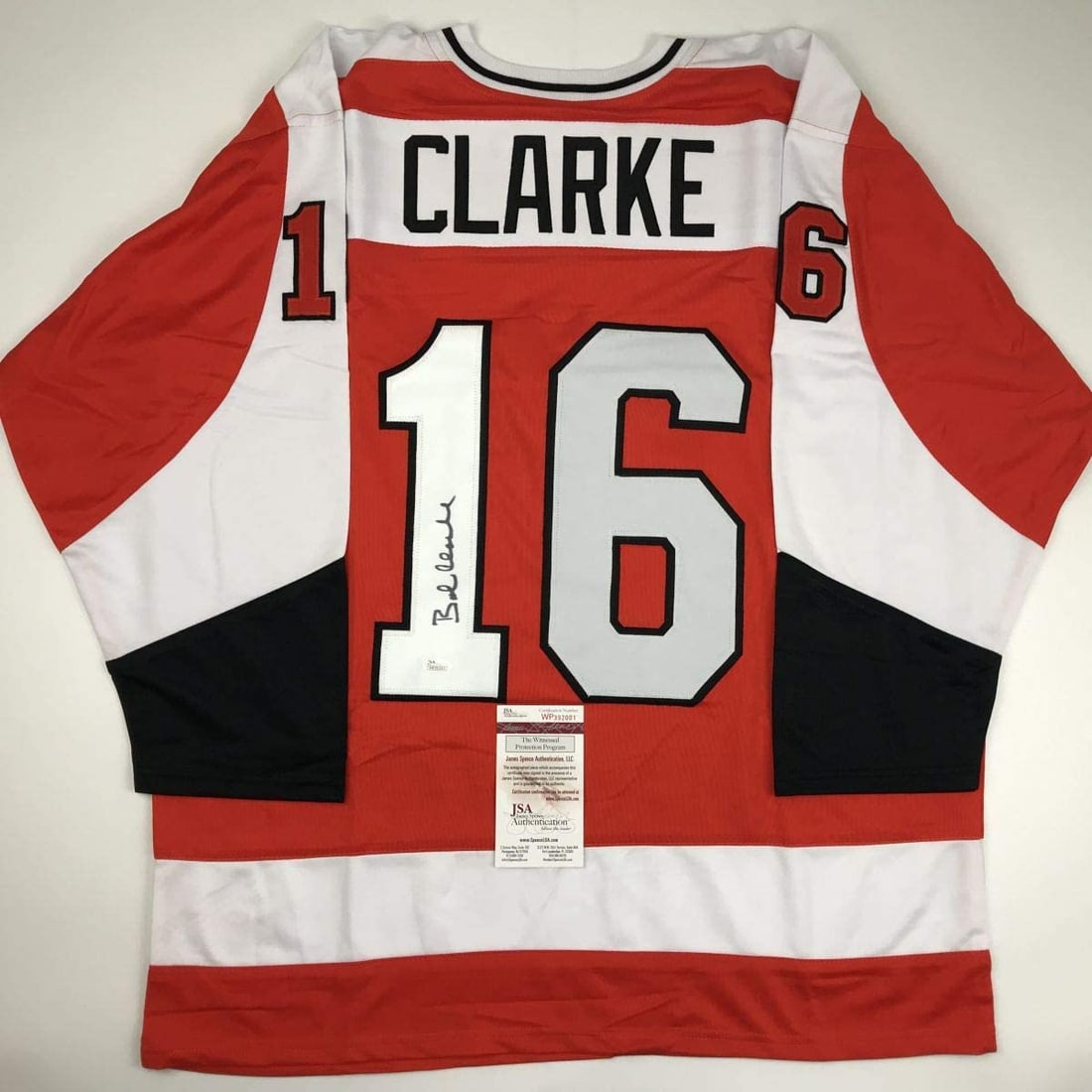 Autographed/Signed Bob Bobby Clarke Philadelphia Orange Hockey Jersey JSA COA: Item will come with a trusted third party certificate of authenticity and/or authentication hologram from PSA, JSA, Beckett, Fanatics, Steiner Sports, Panini, Tristar, or Upper Deck.