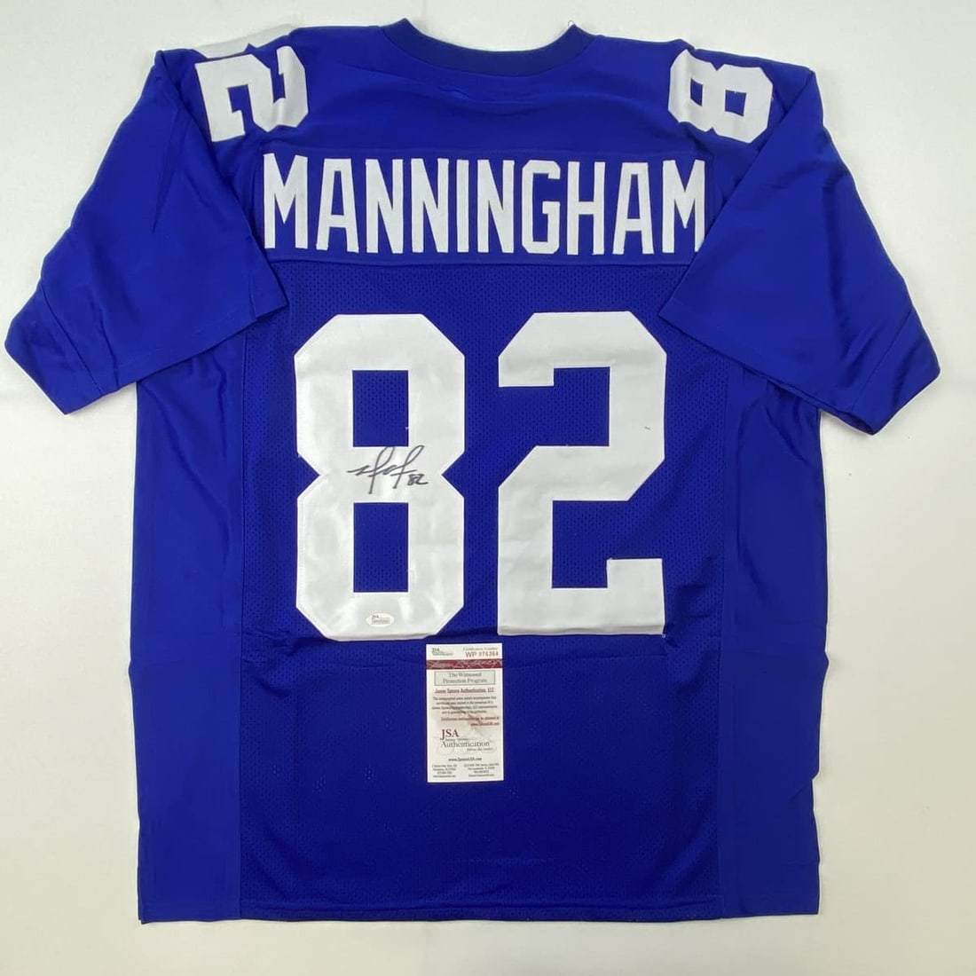 Autographed/Signed Mario Manningham New York Blue Football Jersey JSA COA: Item will come with a trusted third party certificate of authenticity and/or authentication hologram from PSA, JSA, Beckett, Fanatics, Steiner Sports, Panini, Tristar, or Upper Deck.
