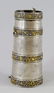A Tibetan white metal and gilt flask, of spreading form