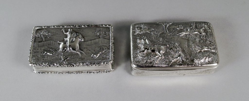 A William IV silver snuff box, Birmingham c.1835,: A William IV silver snuff box, Birmingham c.1835, possibly Thomas Shaw, the cover cast with a hunting scene, with floral border, reeded sides and engine turned base, approx 7cm x 4cm, approx 3.5oz, to