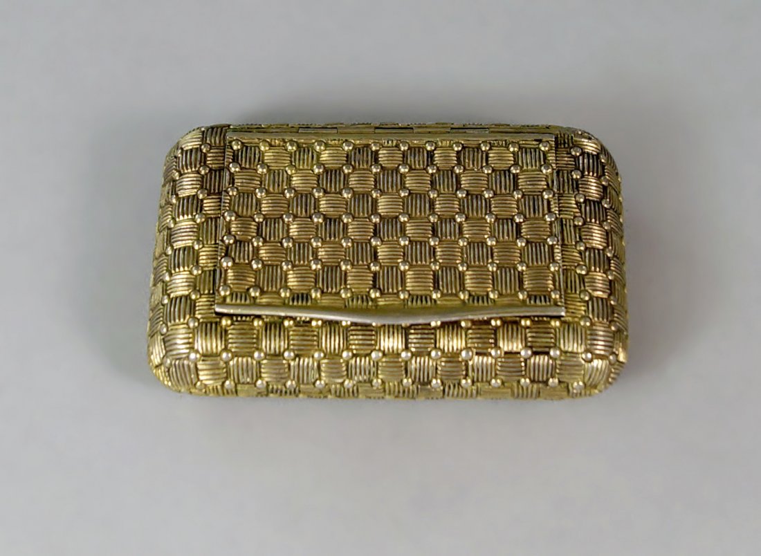 A George III silver gilt snuff box, London circa 1804,: A George III silver gilt snuff box, London circa 1804, by John Riley, cast with a basket weave design, approx 8cm x 5cm, approx 4.1oz.