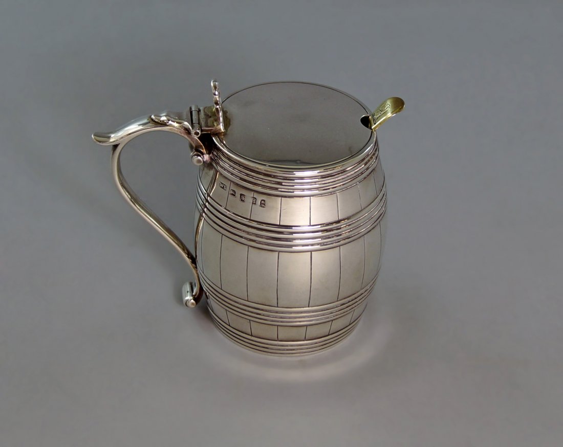 A George III silver novelty mustard, London c.1797,: A George III silver novelty mustard, London c.1797, make WS possibly William Stroud or William Sharp, of barrel form, together with a silver mustard spoon, c.1797, George Smith II, approx 7.5cm, appro