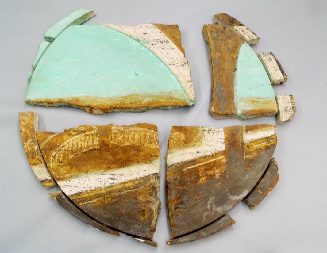 Stephen Cox, British b.1946- ''View from the Loggia:: Stephen Cox, British b.1946- ''View from the Loggia: Tondo'', 1985; travertine, oxides and black cement, total size 88x95cm, (4 pieces) (may be subject to Droit de Suite) Provenance: with Nigel Greenw