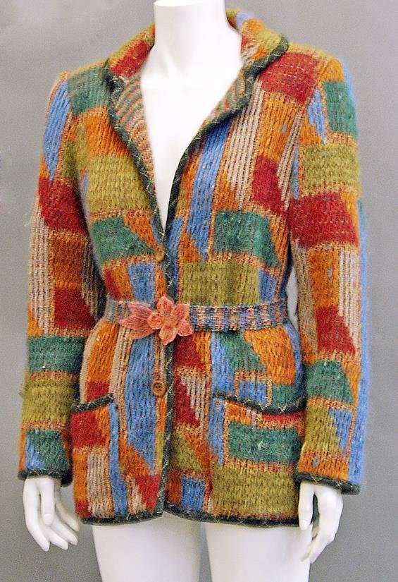 Missoni: A knitted jacket, in autumnal colours, patch: Missoni: A knitted jacket, in autumnal colours, patch pockets and tweed edging, size medium, together with a Missoni A-line wool maxi skirt in blue and red tartan, size 44 and a Missoni knitted cotton