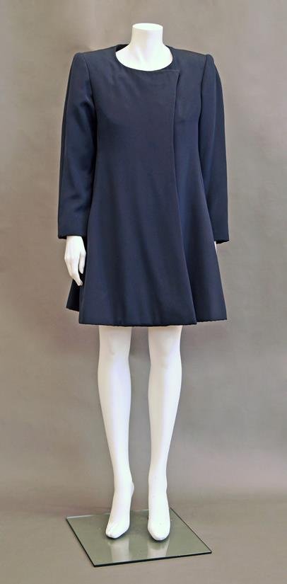 Christian Lacroix: A navy blue collarless coat, with: Christian Lacroix: A navy blue collarless coat, with offset front concealed button fastening, together with a collection of three jackets, all Yves Saint Laurent and a further jacket by Gianni Versace