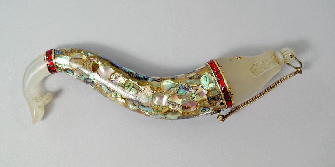 A Mughal jade and mother-of-pearl fish form flask, with: A Mughal jade and mother-of-pearl fish form flask, with a stopper on a chain, 17cm. long