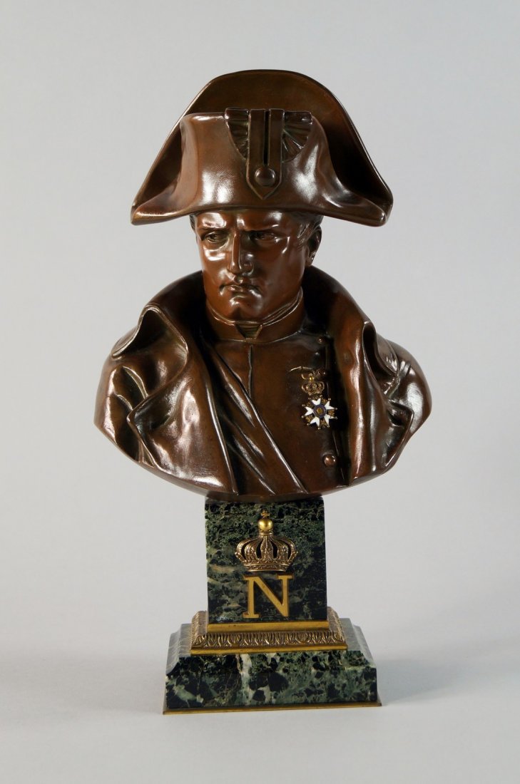 Linedo A bronze bust of Napoleon, late 19th century,: Linedo A bronze bust of Napoleon, late 19th century, modelled with head to dexter with a serious frown, dressed in a great coat and bi-corn hat, mounted on a square section marble pedestal applied in