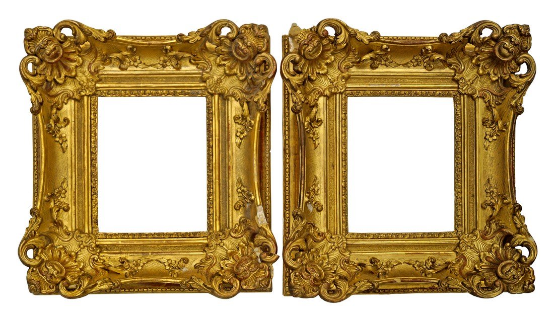 A Pair of Gilt Composition Louis XV Style Swept and: A Pair of Gilt Composition Louis XV Style Swept and Pierced Frames, early-mid 19th century, with cavetto and leaf sight, sanded frieze, the cross-hatched hollow with foliate scrollwork cartouche corne