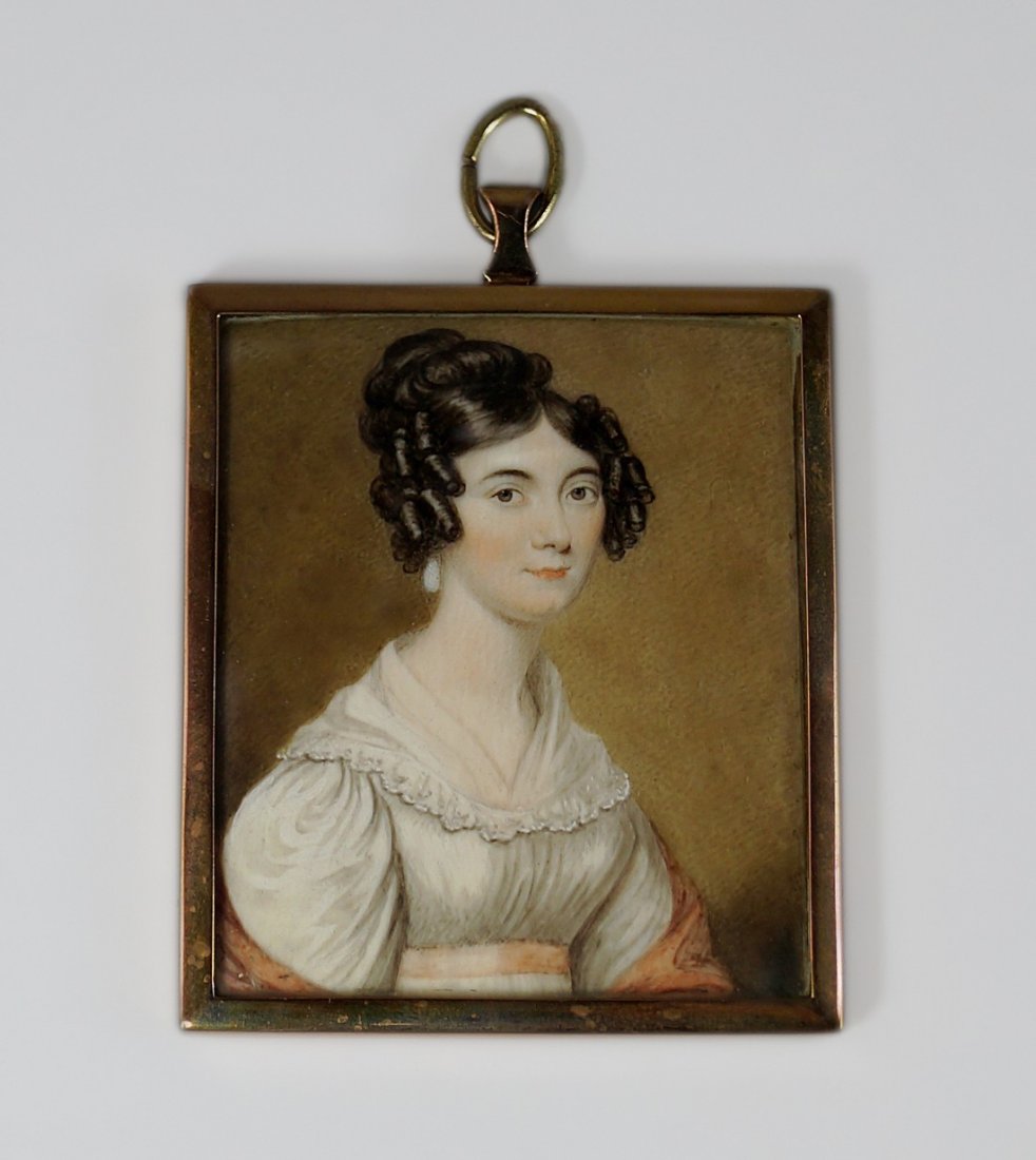 A Portrait Miniature, British School, early 19th: A Portrait Miniature, British School, early 19th century, depicting a lady half-length in a white dress with orange shawl turned to the right, in a rectangular glazed gilt metal frame, 8x6.5cm