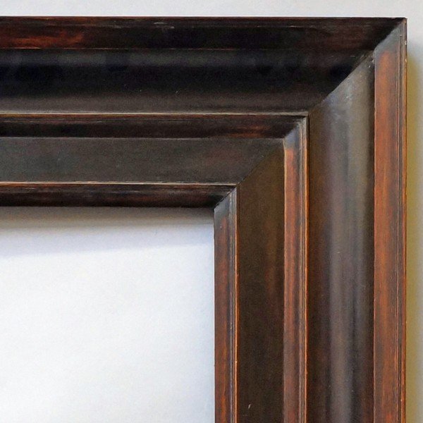 A Dutch Ebonised Moulding Frame, 19th century, with: A Dutch Ebonised Moulding Frame, 19th century, with cushion moulded sight edge, reverse wedge frieze, ogee, plain hollow and wedge and ogee front edge, 50.7x38cm (VAT charged on hammer price)