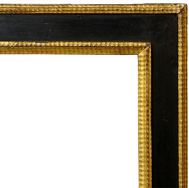 A Dutch Ebonised and Parcel Gilded Cassetta Frame, 18th: A Dutch Ebonised and Parcel Gilded Cassetta Frame, 18th century, with multiple ripples to the sight and back edges, 45x36.9cm
