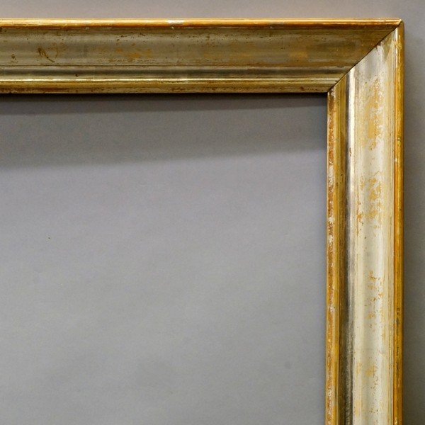 A French Silvered Charles X Style Frame, 19th century,: A French Silvered Charles X Style Frame, 19th century, with ogee sight and hollow, plain top knull, 77x60.5cm