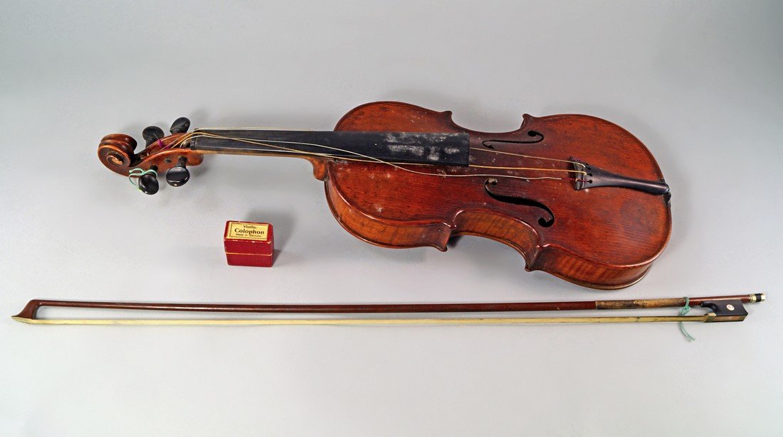 A Violin, 19th century, with interior label for: A Violin, 19th century, with interior label for Iofredus Cappa in Saluzzio Fecit Anno 1640, with unmarked bow, in wooden case (VAT charged on hammer price)