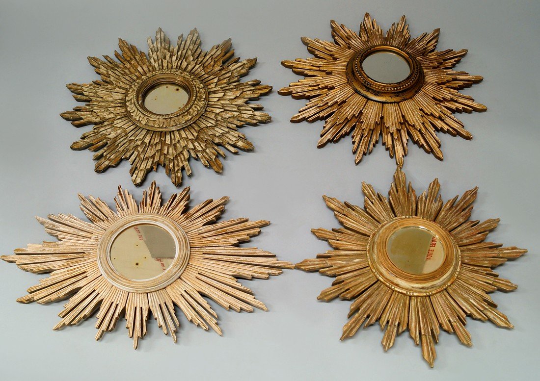 A collection of six giltwood sunburst mirrors, 20th: A collection of six giltwood sunburst mirrors, 20th century, various sizes, the largest 57cm high(6)