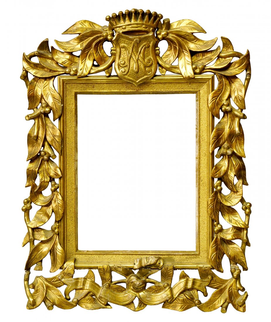 A Florentine Carved, Pierced and Gilded Frame, 19th: A Florentine Carved, Pierced and Gilded Frame, 19th century, with cavetto sight, sanded frieze, reverse ogee, boldly scrolling leaf, berry and branch running between shield and crown crest centre top 