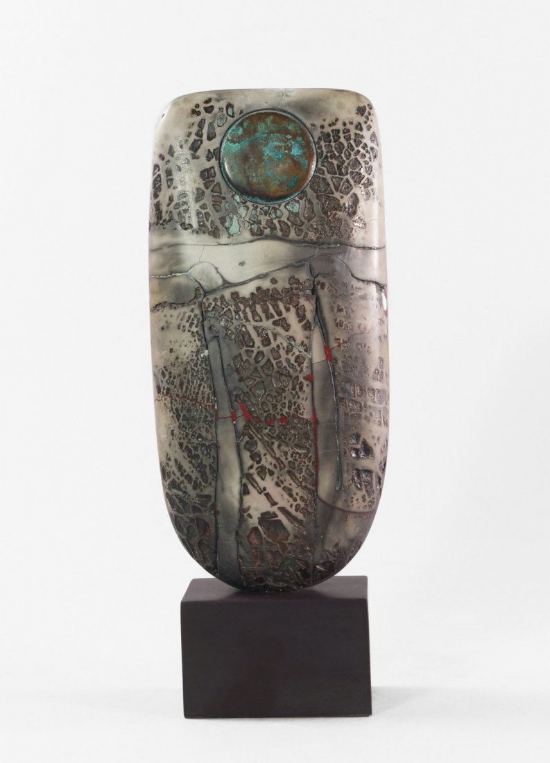 Peter Hayes, British b.1946, Small Totem, 2004, the: Peter Hayes, British b.1946, Small Totem, 2004, the raku standing form with copper patina disc, upon slate base, signed Peter Hayes '04 to base, approx 25.5cm high. (may be subject to Droit de Suite)