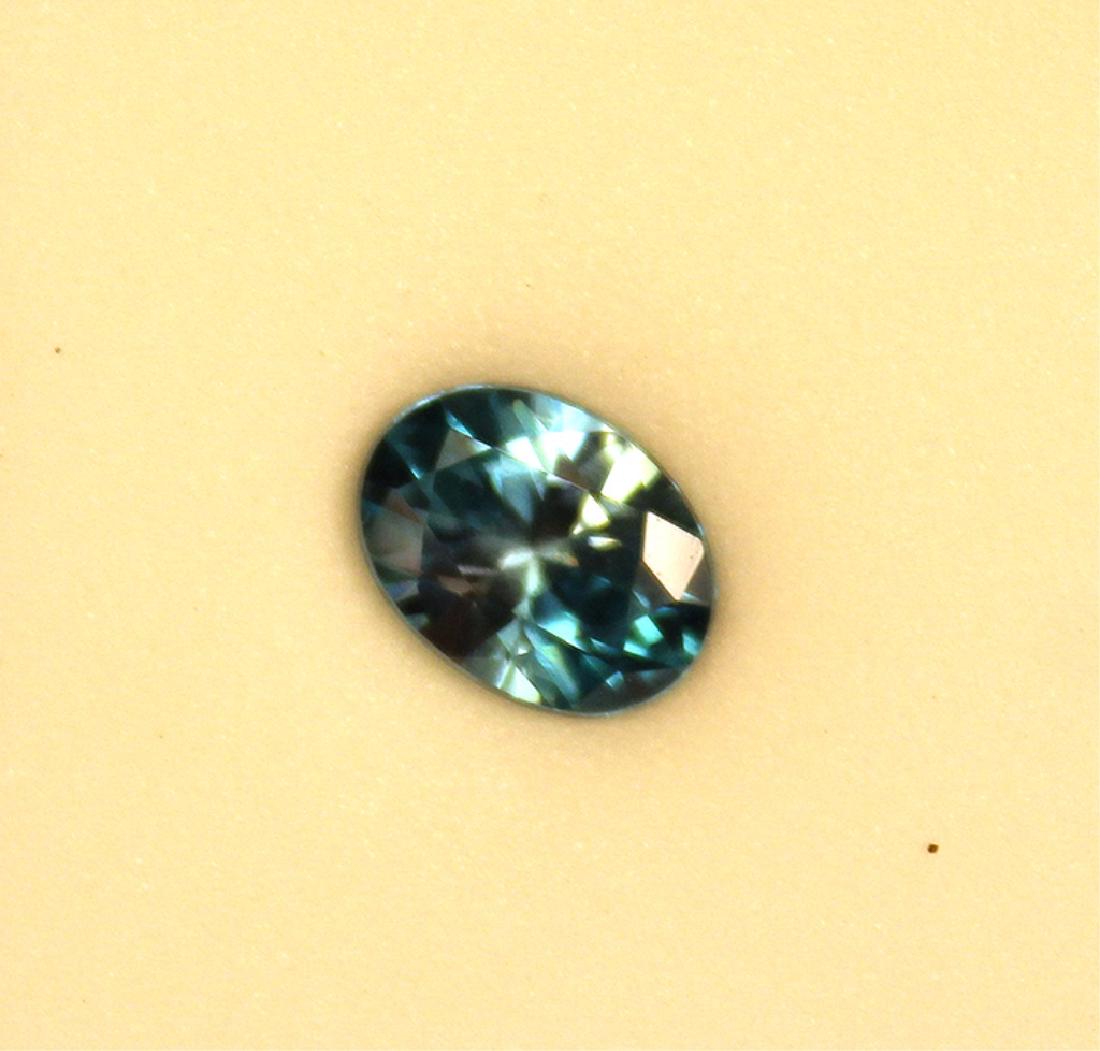 2.53 CT Oval Cambodian Blue Zircon Gemstone: 2.53 CT 9.20x6.94MM oval Cambodian Blue Zircon gemstone. Originally purchased for $242.45.