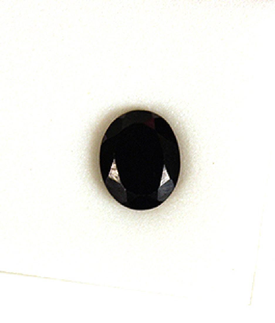 3.50 CT MIN 10x8MM Black Spinel Gemstone: 3.50 CT MIN 10x8MM oval Black Spinel gemstone.