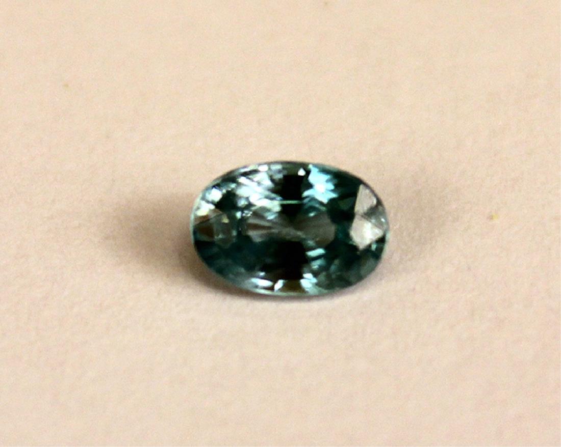 .65 CT MIN 6x4MM Blue Cambodian Zircon Gemstone: .65 CT MIN 6x4MM oval Blue Cambodian Zircon gemstone.