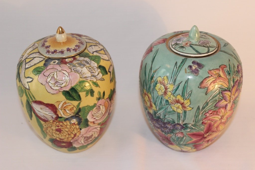 Two lidded ginger jars. One yellow and one blue: Two lidded ginger jars. One yellow and one blue. Size: 7.5" H x 5" Dia.
