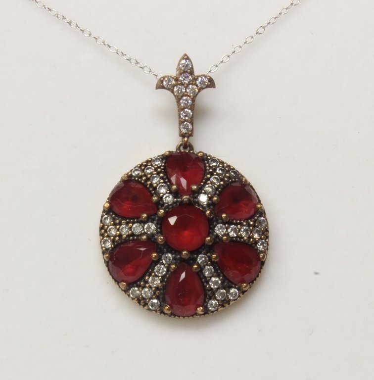 Genuine ruby necklace set in sterling silver.: Genuine ruby necklace set in sterling silver.