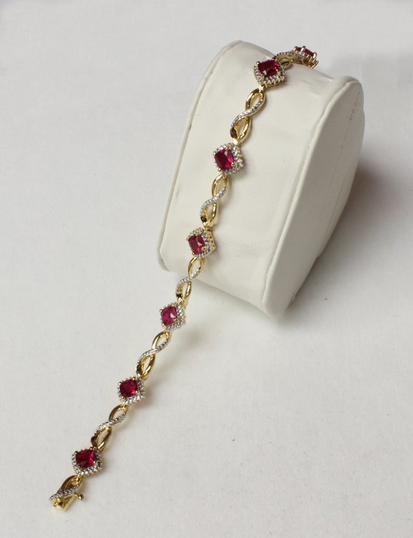 Ruby and diamond bracelet set in sterling silver.: Ruby and diamond bracelet set in sterling silver.