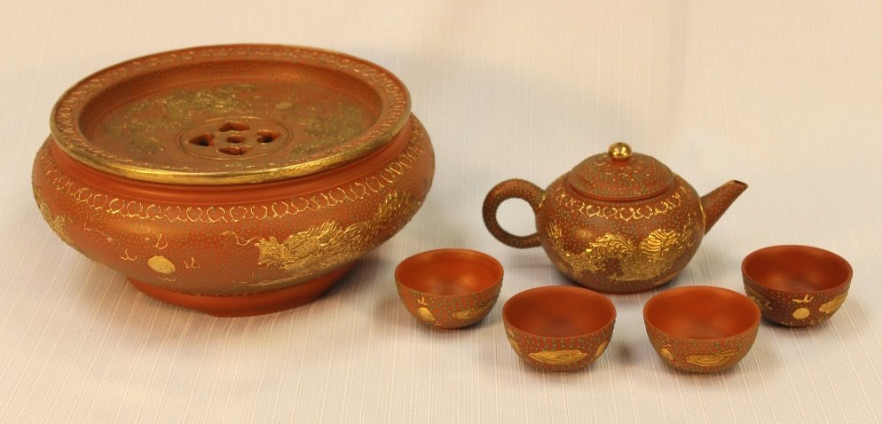Six piece ceramic Chinese tea set and incense buin: Six piece ceramic Chinese tea set with incense burner. Size: 3" H x 8" Dia, Tea pot size: 3" H x 5.5" Dia