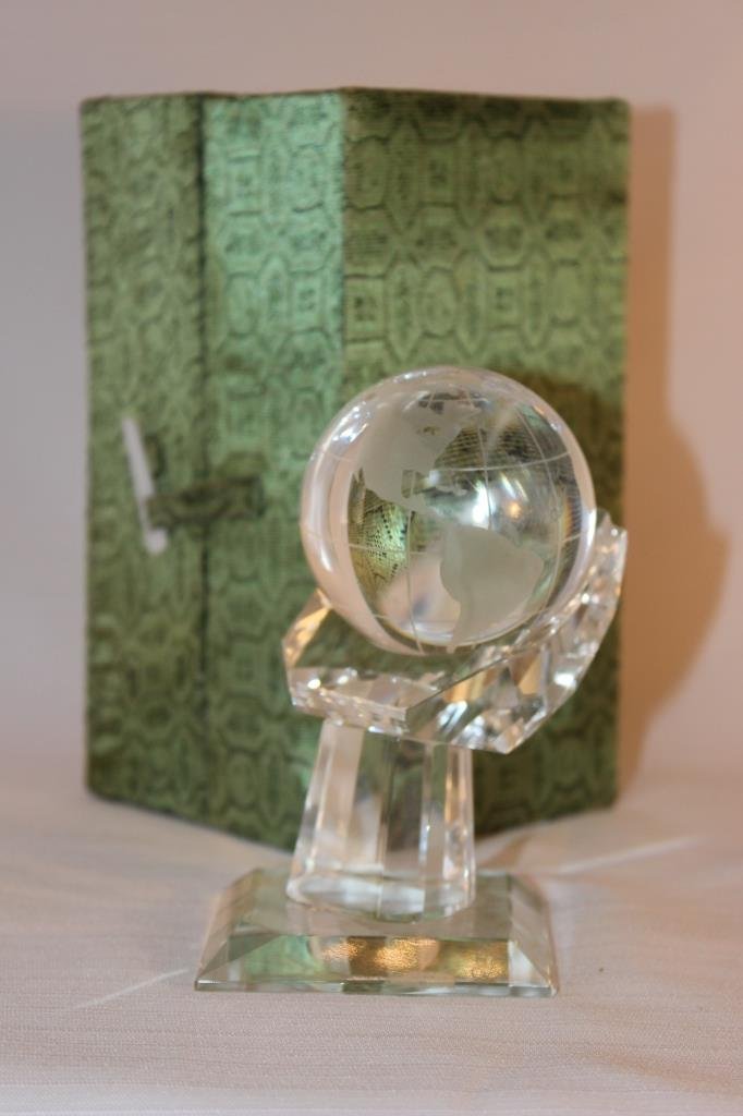 Etched crystal globe on cut crystal stand: Etched crystal globe on cut crystal stand with pen holder. Size: 4.75" H x 2.75" W x 2.75" D