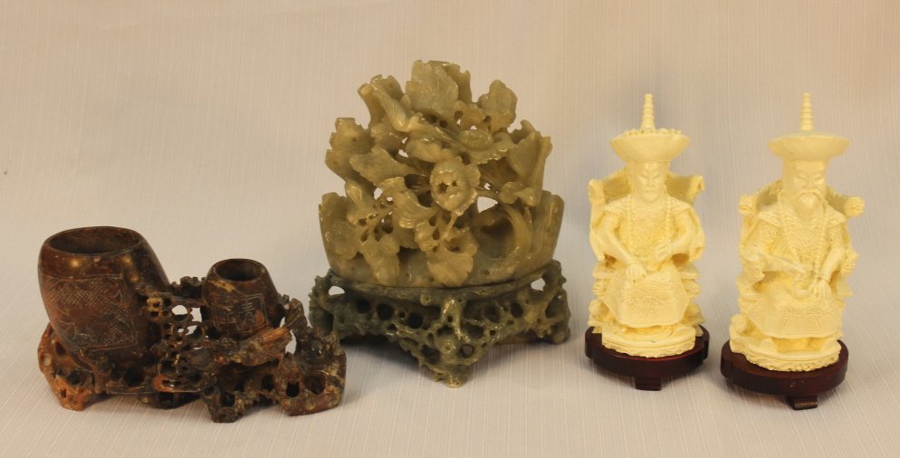 Four pieces, carved soapstone and emperors: Two pieces of carved soapstone and male and female emperor figurines.