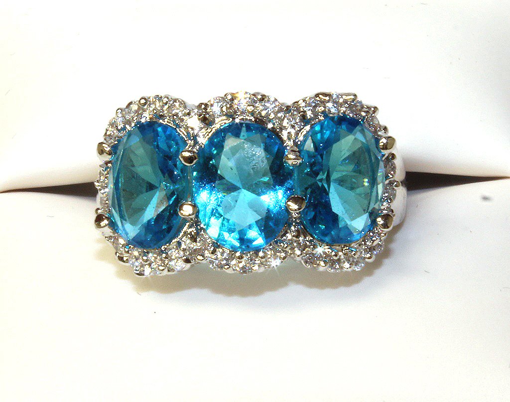 4 ct. blue topaz dinner ring set in SS (1 of 2)