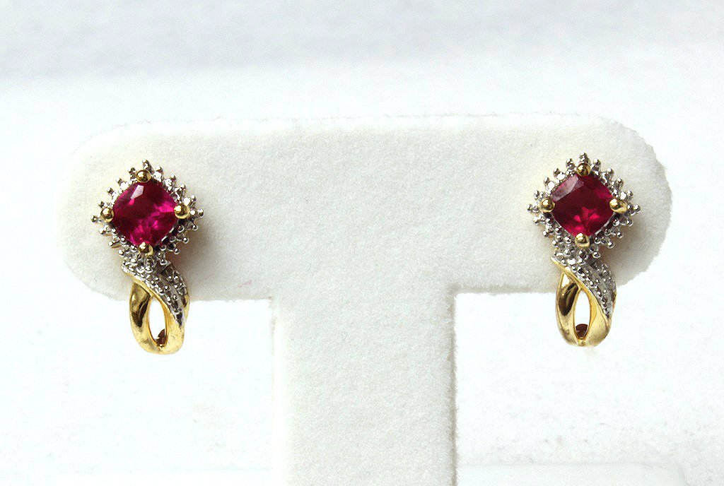 Ruby and diamond earrings set in sterling silver (1 of 2)