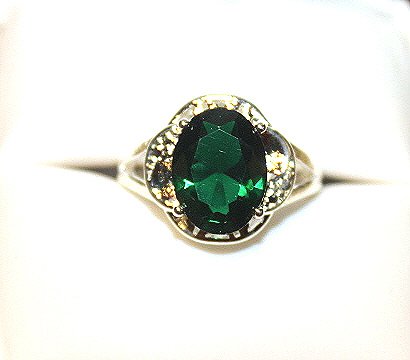 3 ct. emerald dinner ring set in sterling silver. (1 of 2)