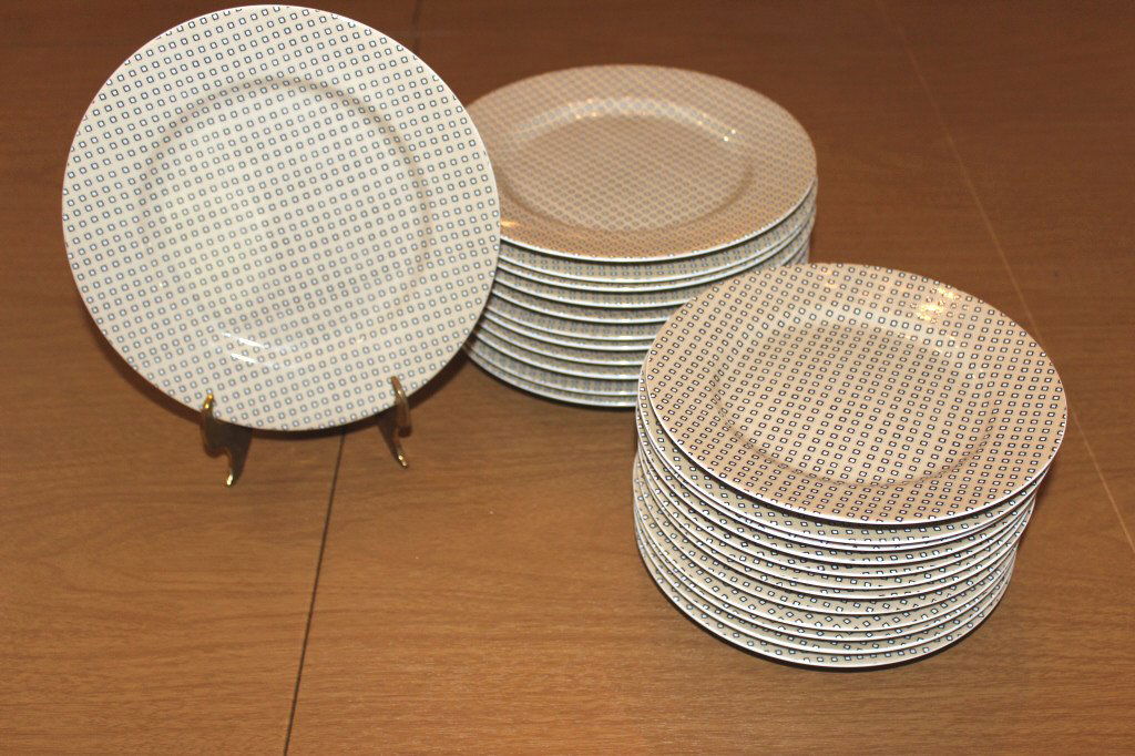 Fitz and Floyd saucers and bread plates.: 12 Fitz and Floyd saucers. 12 Fitz and Floyd bread plates. Both sets of 12 are in the Foulard pattern - Taupe and black.