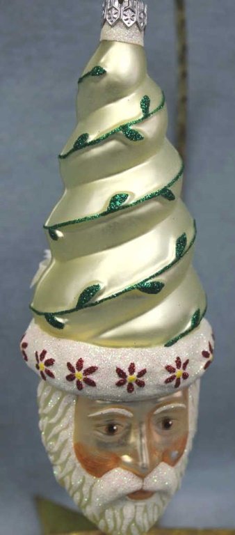 Patricia Breen "Goslar Santa" Ornament: Patricia Breen "Goslar Santa" pearl, red, and green Christmas ornament. Pearl white cone-shaped hat wrapped in trailing green vines with red flowers. Stand not included. Size: 6.5" H