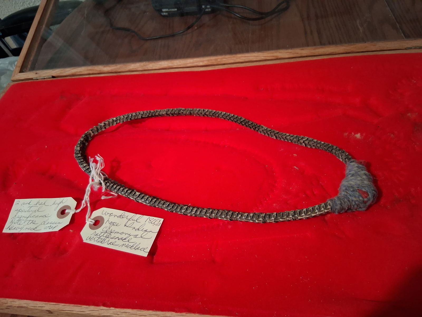 Rattlesnake Necklace: Antique rattlesnake vertebrae necklace dated from the 1800s. Has high spiritual significance and ceremonial purpose. Note the heavy neck design set up. Worn during special tribal ceremonies.