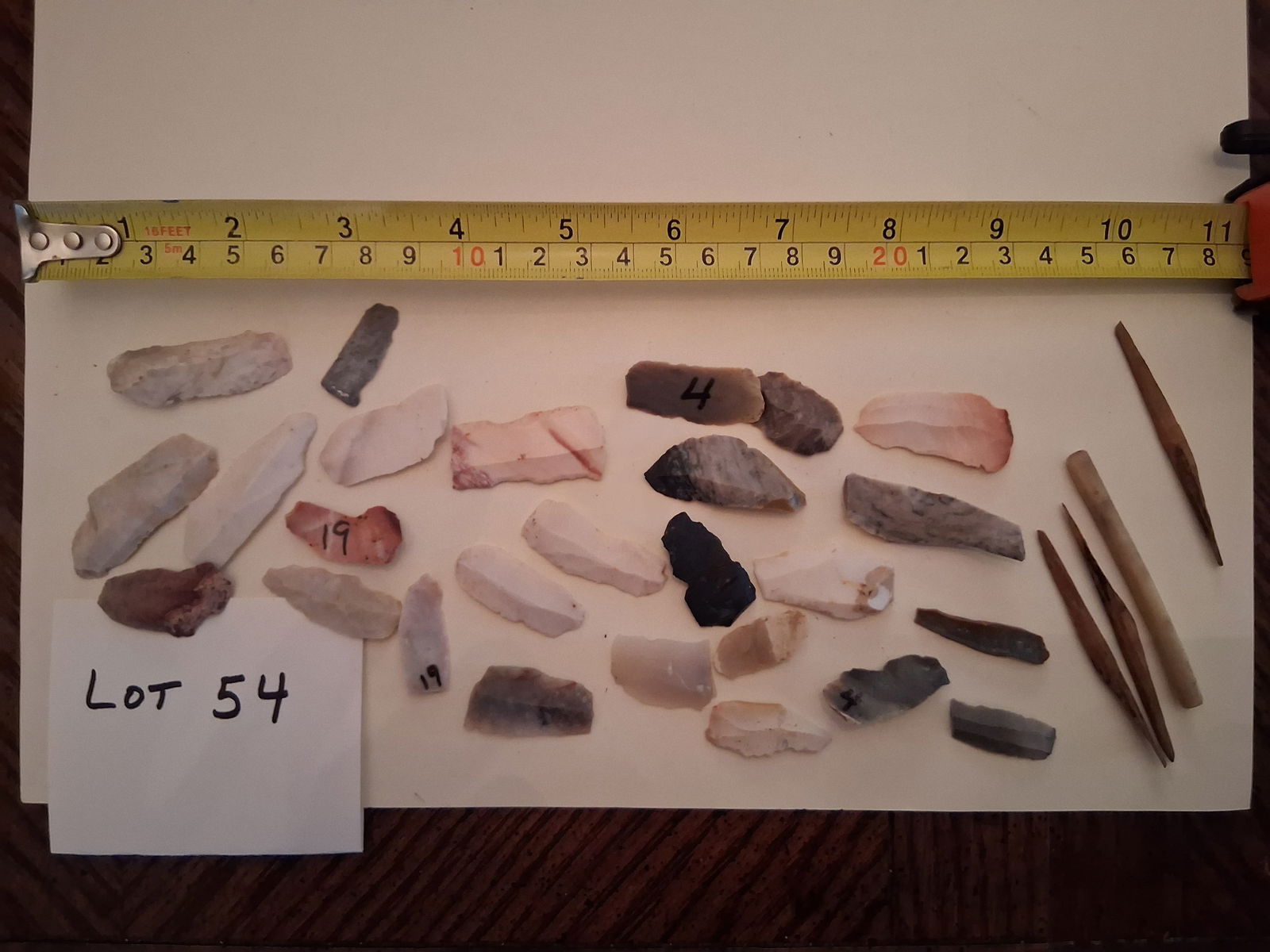 Original Prehistoric Cutting Tools Lot: Prehistoric blades, perhaps the original cutting tools. Shown also many fishing implements called gorges, which were placed parallel in a smaller fish mouth and then tugged on when a larger fish swall