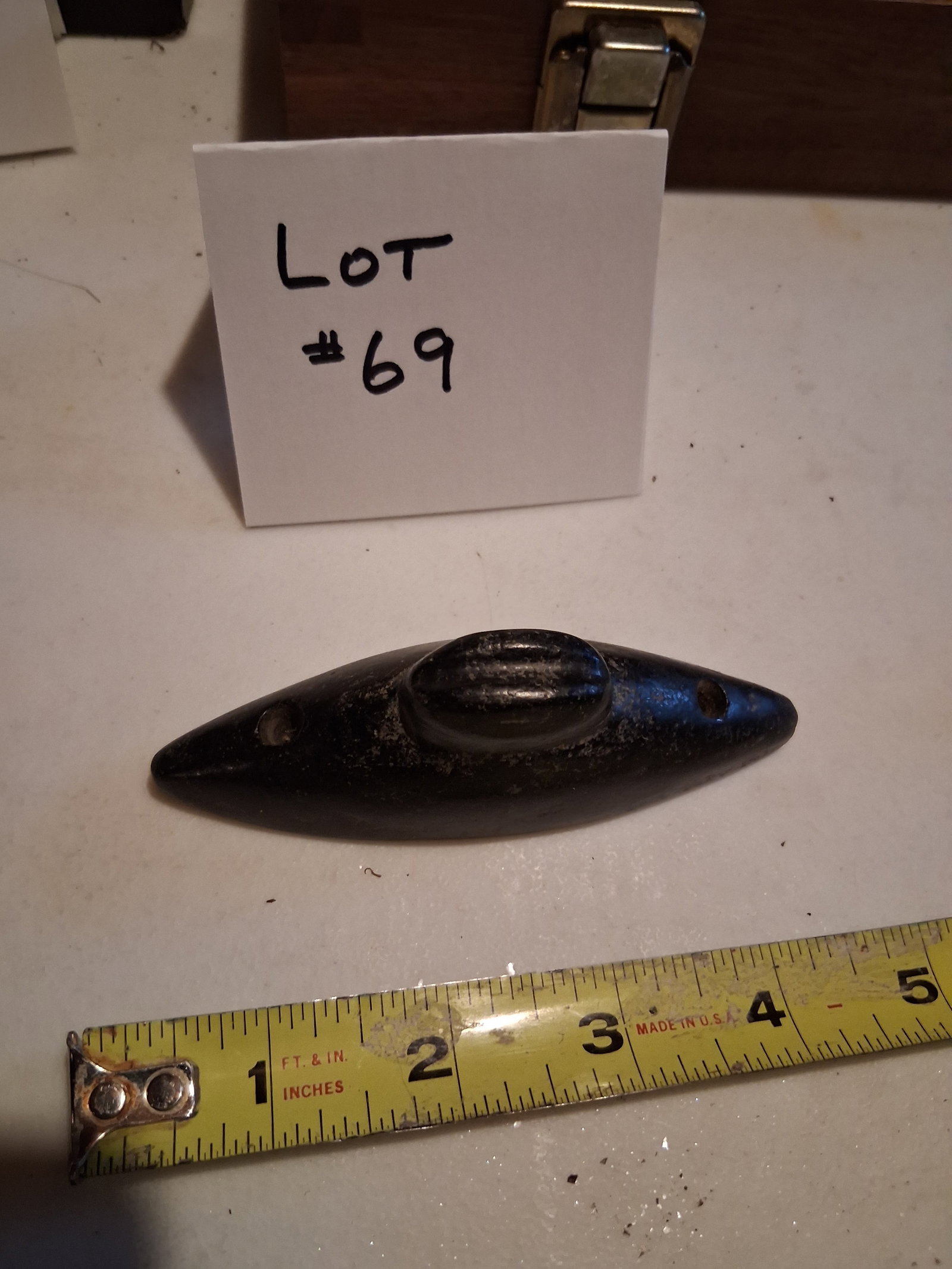 Carved Stone Fishing Weight: Carved Stone Fishing Weight.