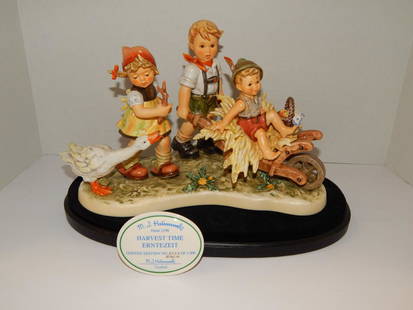 Goebel Hummel #2190: Harvest Time #AP61 of 100. This is the artist proof version. Includes base and plaque. Excellent condition, with box. 8" h.