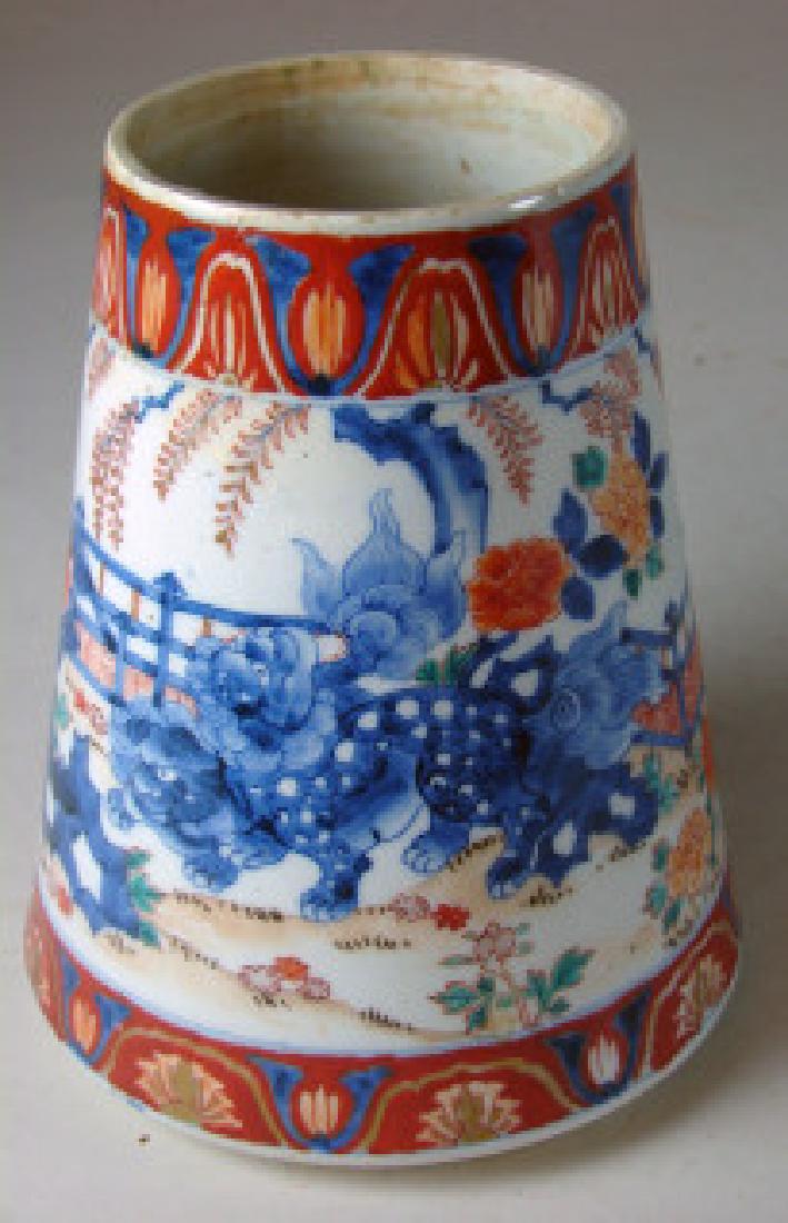 Hand Painted Chinese Porcelain Vase: with multiple foo dogs. Repaired rim chip and hair line crack from top to bottom down one side as well as in bottom. Multiple characters on bottom. 7 3/4" h x 6 1/2" w